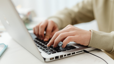 Student accessing out virtual learning environment (VLE) on a laptop